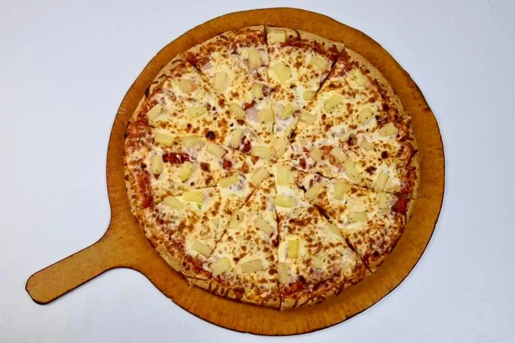 Fresh pizza with generous toppings Pizza 64 Millwoods